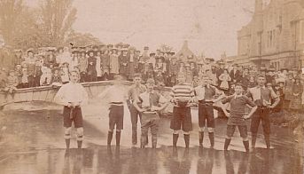 This splendid photograph of Bourton-on-the-Water's traditional river football match dates back to the 1920s.